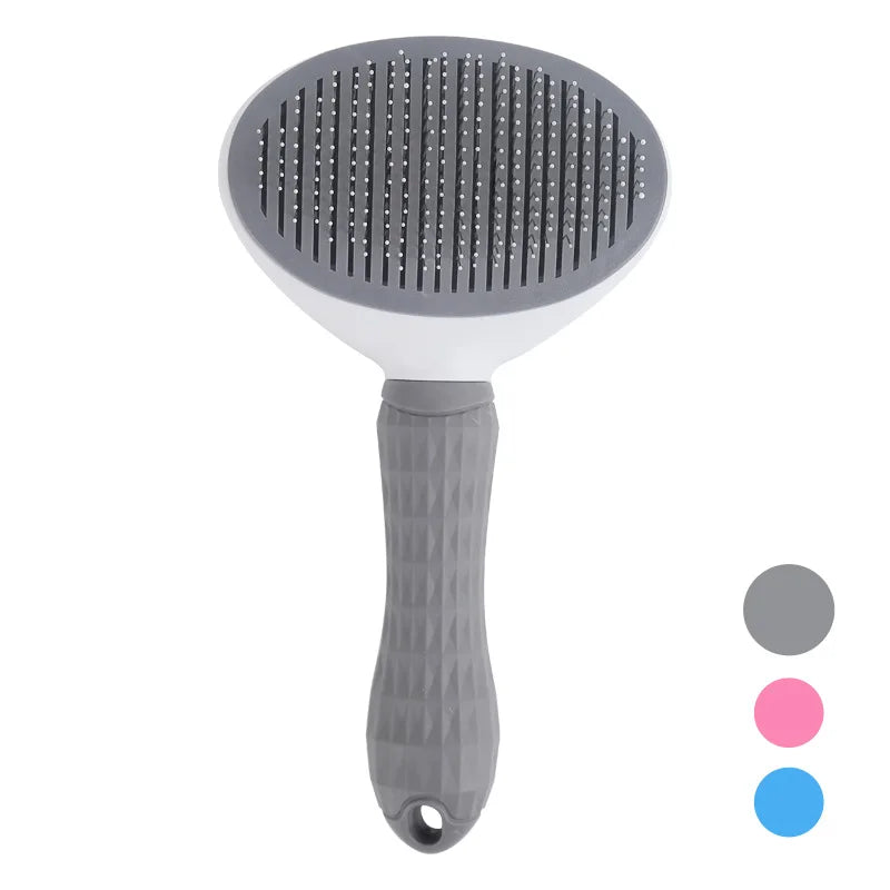 Grey self-cleaning pet brush showing retractable bristle mechanism